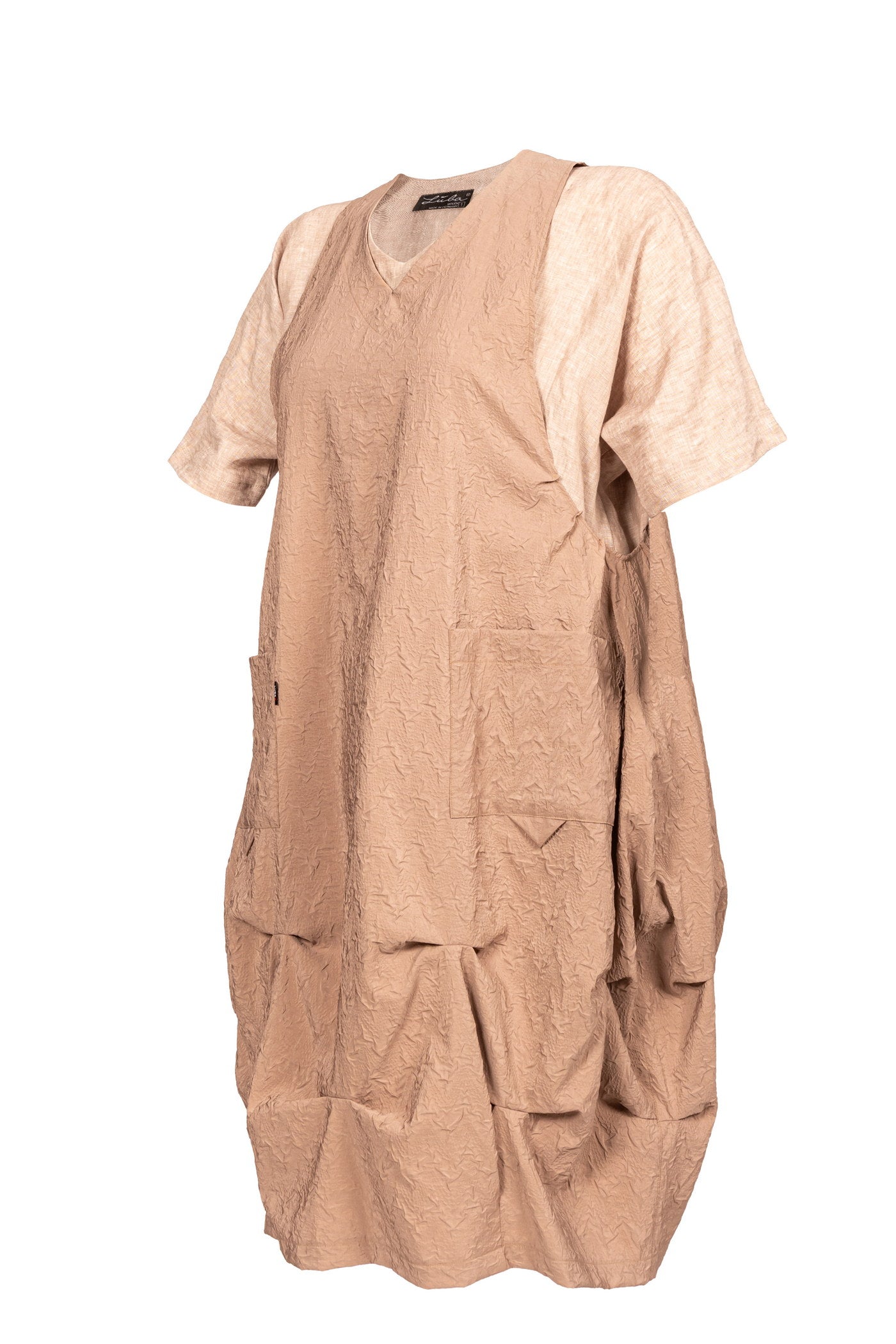 Ausgefallene beige Leinen-Tunika mit 2 praktischen Taschen.