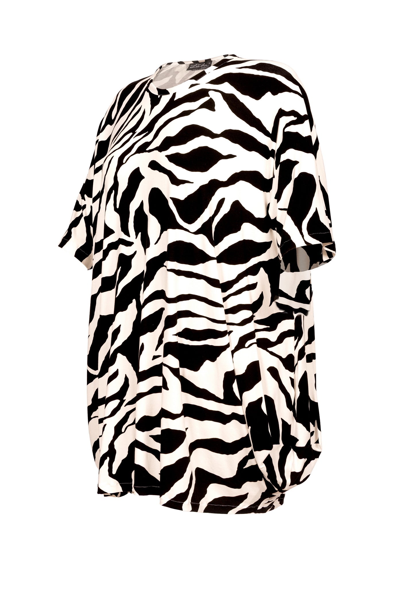 Elegante figurumschmeichelnde schwarz-weiß gemusterte Jersey-Tunika.