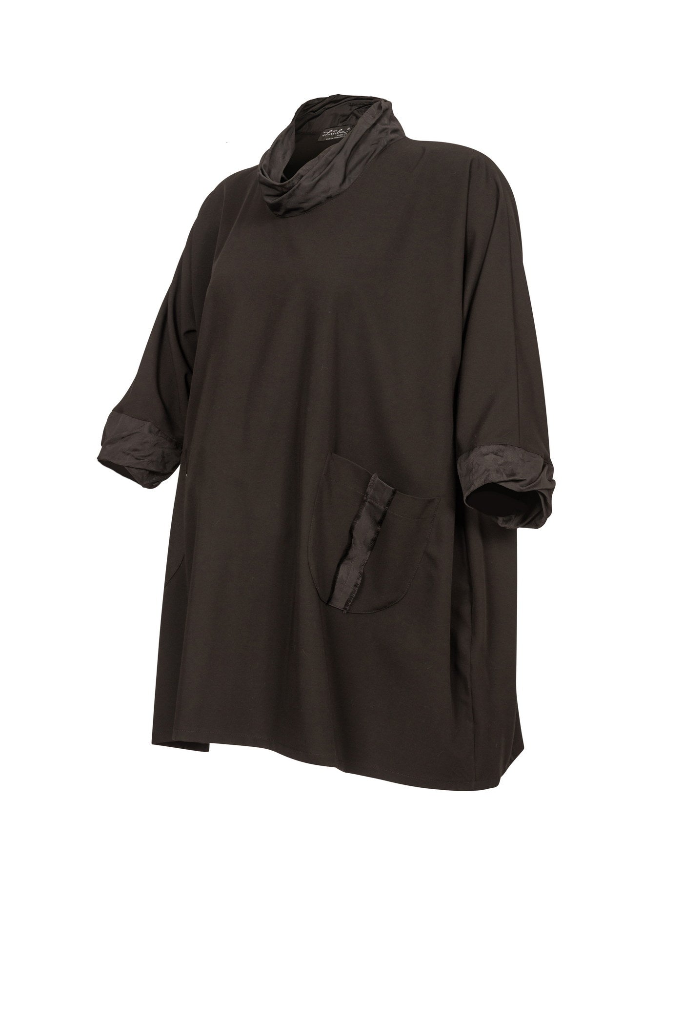 Ausgefallene schwarze Tunika mit ballonförmigem Rockteil.