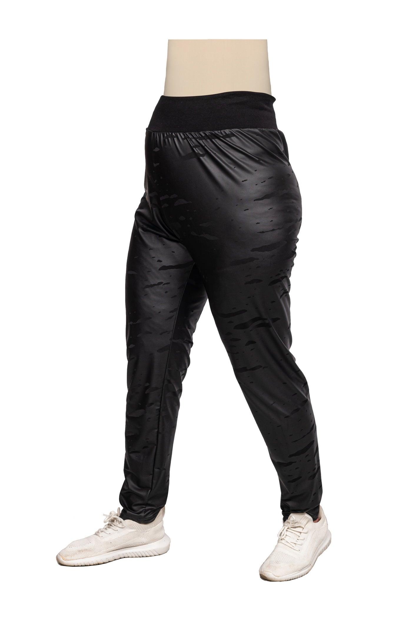 Schwarze Jersey-Leggings mit Lederimitat und Strickmuster - Seitenansicht